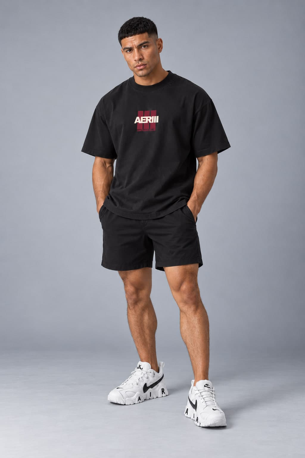 LIMITLESS CLUB BLACK tee in black, front, full length, on a male model