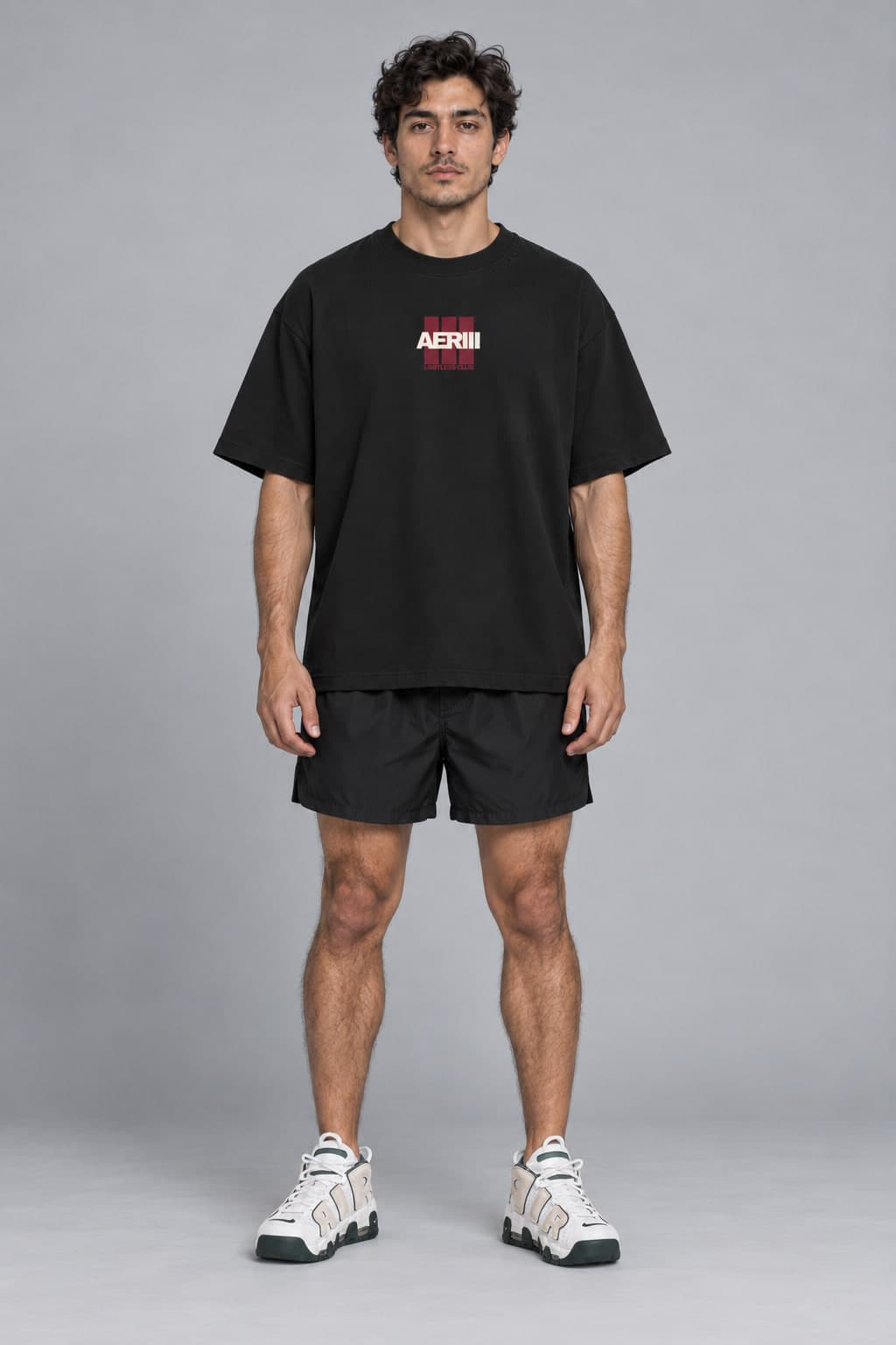 LIMITLESS CLUB BLACK tee in black, front, full length, on a female model